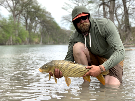 man holding fish