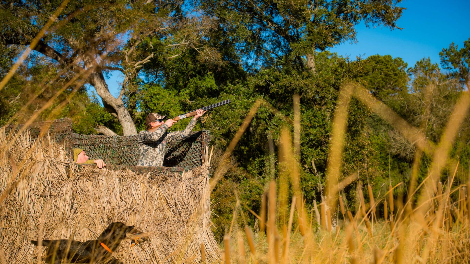 Hunter with dog at Joshua Creek Ranch